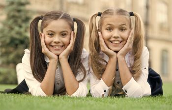 two smiling schoolgirls